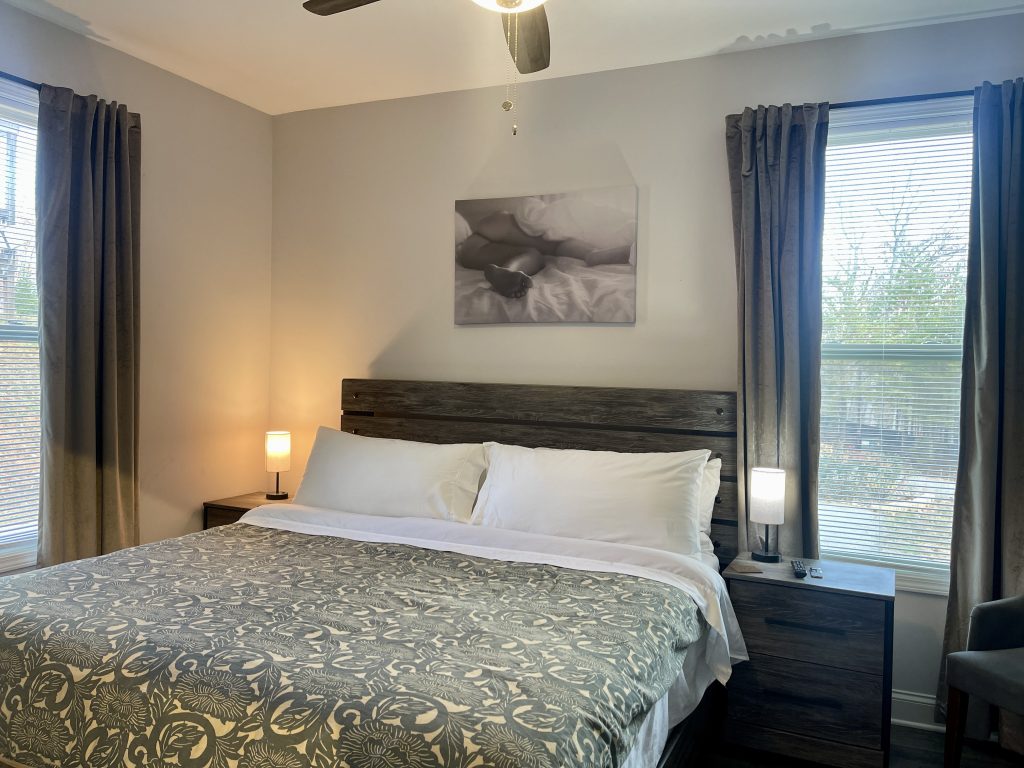 Cozy bedroom with king bed and lamps